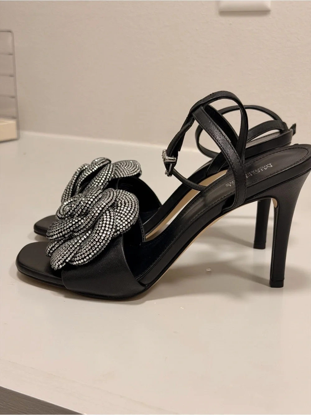 MICHAEL Michael Kors Black Heeled Sandals with Crystal Rosette